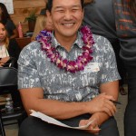 Song Choi of First Hawaii Bank, smiles for the camera as he looks over the criteria on his judging sheet