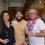 From left, Linda DeCosta, Paul Spencer and Andrew Rosen of Summit Media pose for a photo during a break